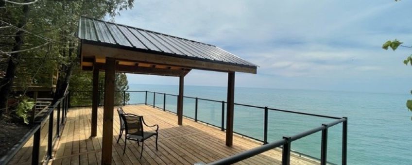 Glass Railings with black aluminum frames and posts